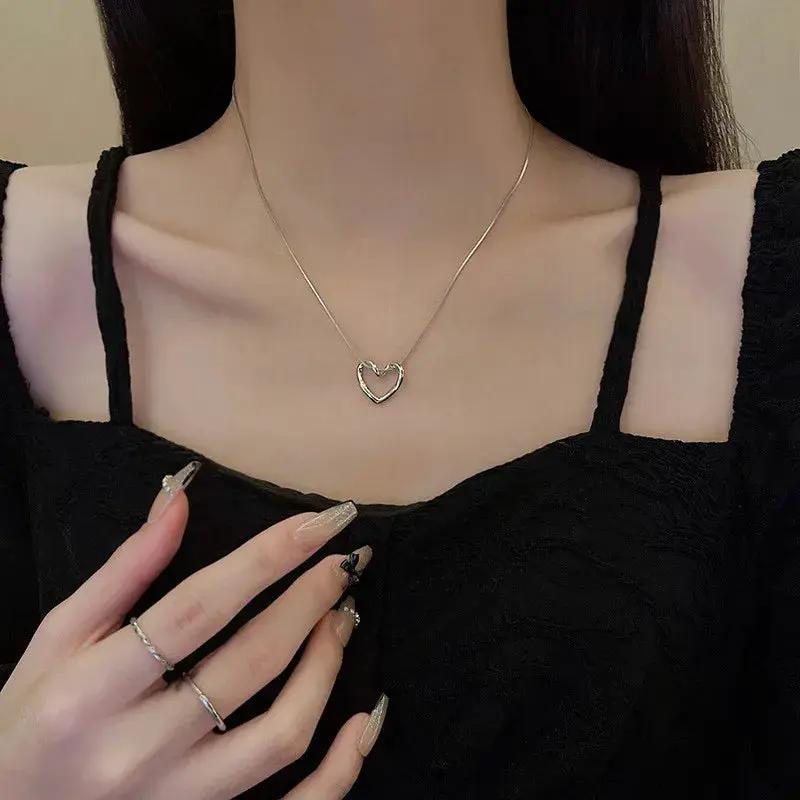 AuroreWear Twist Hollow Heart Pendant Necklace by AuroreWear